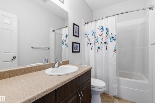 Full bathroom featuring vanity and shower / bath combo with shower curtain - 313 263 Macewan Road, Edmonton, AB - Indoor Photo Showing Bathroom
