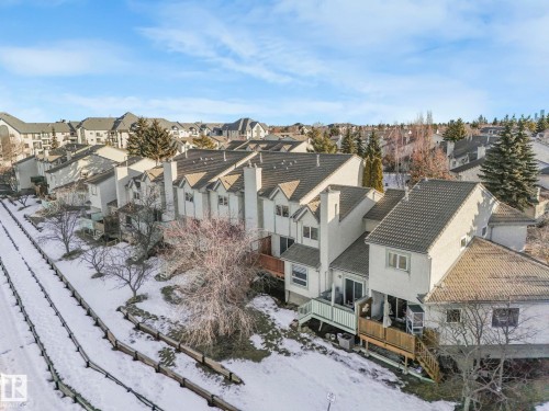 Snowy aerial view featuring a residential view - 61 9520 174 Street, Edmonton, AB - Outdoor