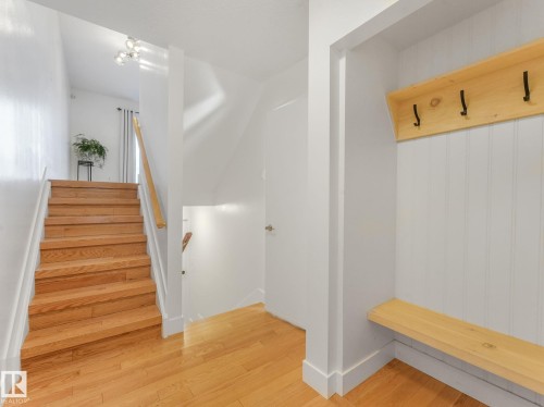 Mudroom with light wood-style flooring and baseboards - 61 9520 174 Street, Edmonton, AB - Indoor Photo Showing Other Room