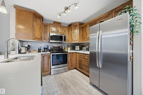 310 17407 99 Avenue, Edmonton, AB - Indoor Photo Showing Kitchen With Stainless Steel Kitchen With Double Sink