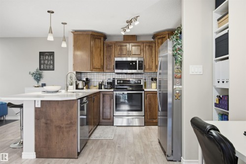 310 17407 99 Avenue, Edmonton, AB - Indoor Photo Showing Kitchen With Stainless Steel Kitchen With Double Sink With Upgraded Kitchen