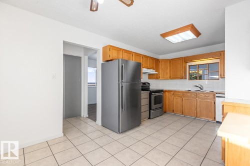 12411 53 Street, Edmonton, AB - Indoor Photo Showing Kitchen With Double Sink