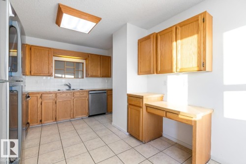 12411 53 Street, Edmonton, AB - Indoor Photo Showing Kitchen With Double Sink