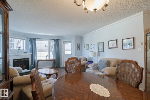 112 17150 94A Avenue, Edmonton, AB - Indoor With Fireplace