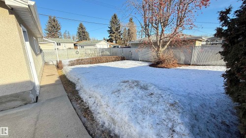 Fenced backyard with a residential view - 4608 102 Avenue, Edmonton, AB - Outdoor