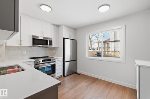 14630 54 Street, Edmonton, AB - Indoor Photo Showing Kitchen With Double Sink With Upgraded Kitchen