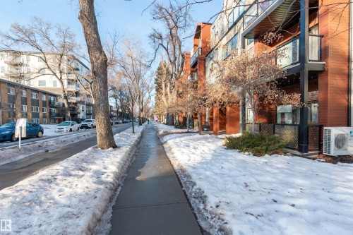 View of asphalt street featuring sidewalks - 105 10006 83 Avenue, Edmonton, AB - Outdoor