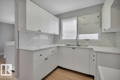 4122 46 Street, Leduc, AB - Indoor Photo Showing Kitchen With Double Sink