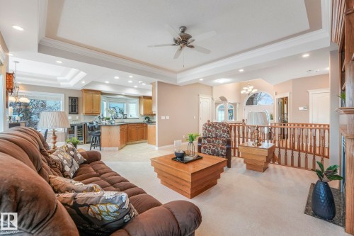 81 Promenade Boulevard, Beaumont, AB - Indoor Photo Showing Living Room With Fireplace