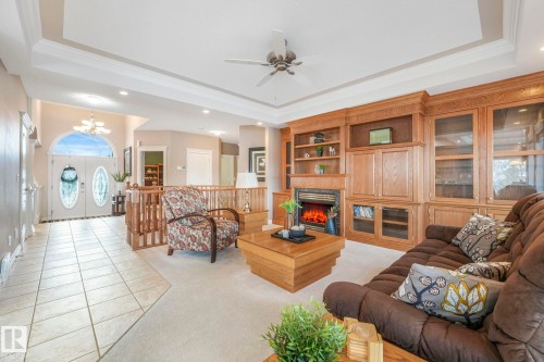 81 Promenade Boulevard, Beaumont, AB - Indoor Photo Showing Living Room With Fireplace