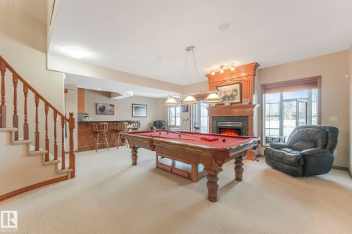 81 Promenade Boulevard, Beaumont, AB - Indoor Photo Showing Other Room With Fireplace