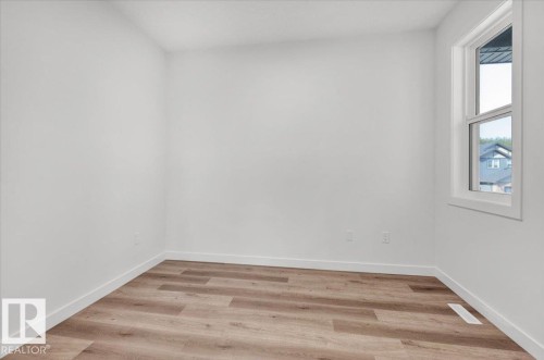 1154 Gyrfalcon Crescent, Edmonton, AB - Indoor Photo Showing Other Room