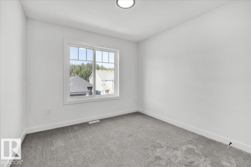 1154 Gyrfalcon Crescent, Edmonton, AB - Indoor Photo Showing Other Room