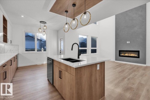 1115 Gyrfalcon Crescent, Edmonton, AB - Indoor Photo Showing Kitchen With Double Sink With Upgraded Kitchen