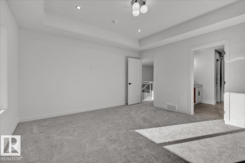 1115 Gyrfalcon Crescent, Edmonton, AB - Indoor Photo Showing Other Room