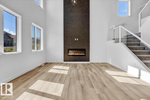 1119 Gyrfalcon Crescent, Edmonton, AB - Indoor With Fireplace