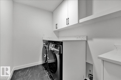 1119 Gyrfalcon Crescent, Edmonton, AB - Indoor Photo Showing Laundry Room