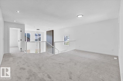 1119 Gyrfalcon Crescent, Edmonton, AB - Indoor Photo Showing Other Room