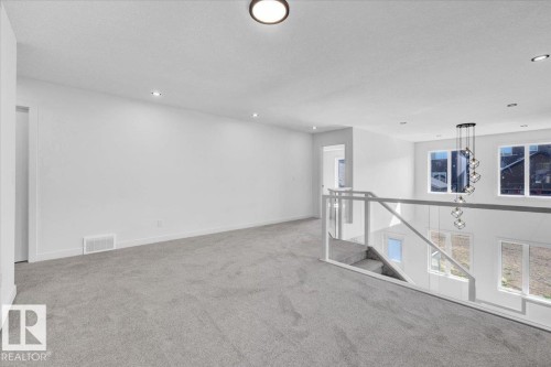 1119 Gyrfalcon Crescent, Edmonton, AB - Indoor Photo Showing Other Room