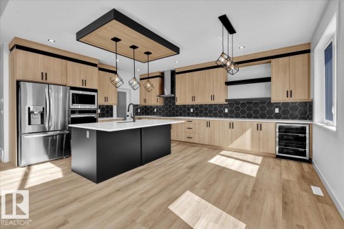 1119 Gyrfalcon Crescent, Edmonton, AB - Indoor Photo Showing Kitchen With Upgraded Kitchen