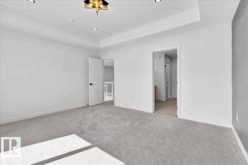1119 Gyrfalcon Crescent, Edmonton, AB - Indoor Photo Showing Other Room