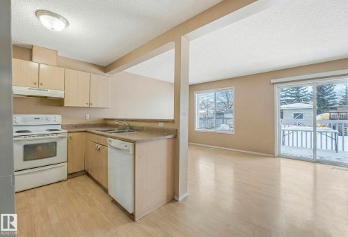 13826 38 Street, Edmonton, AB - Indoor Photo Showing Kitchen With Double Sink