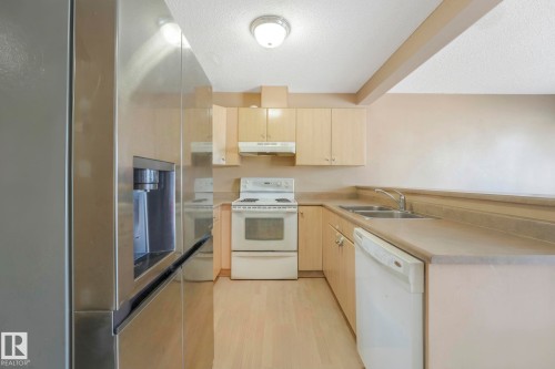 13826 38 Street, Edmonton, AB - Indoor Photo Showing Kitchen With Double Sink