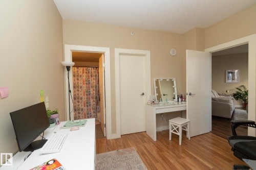 Office area featuring light wood finished floors - 1004 10136 104 Street, Edmonton, AB - Indoor
