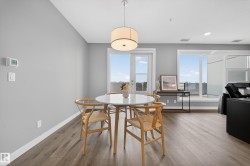 Dining space featuring wood finished floors - 
