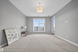 Unfurnished room featuring carpet floors and baseboards - 