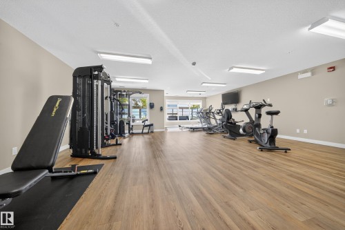 Workout area featuring a textured ceiling - 416 61 Festival Way, Sherwood Park, AB - Indoor Photo Showing Gym Room
