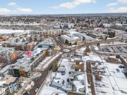 Aerial view of property and surrounding area with nearby urban area - 