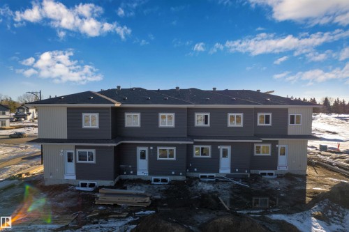 Snow covered house with a residential view - 171 Graybriar Drive, Stony Plain, AB - Outdoor With Facade