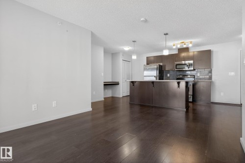 406 3353 16A Avenue, Edmonton, AB - Indoor Photo Showing Kitchen With Stainless Steel Kitchen
