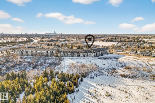 View of snowy aerial view - 357 1196 Hyndman Road, Edmonton, AB - Outdoor With View