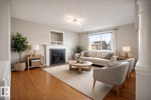 144 55 Street, Edmonton, AB - Indoor Photo Showing Living Room With Fireplace