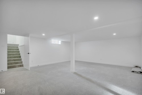 Basement with light colored carpet and recessed lighting - 5021 46 Avenue, Calmar, AB - Indoor Photo Showing Other Room