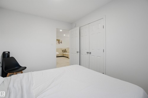 Bedroom featuring a closet - 9882 225A St Nw, Edmonton, AB - Indoor Photo Showing Bedroom