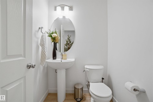 Bathroom with wood finished floors - 9882 225A St Nw, Edmonton, AB - Indoor Photo Showing Bathroom