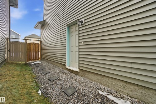 View of side of home with a gate - 9882 225A St Nw, Edmonton, AB - Outdoor