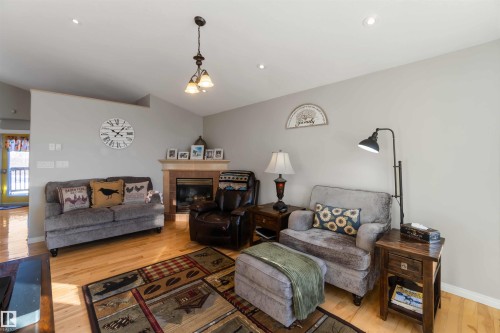 5133 54 Avenue, Redwater, AB - Indoor Photo Showing Living Room With Fireplace