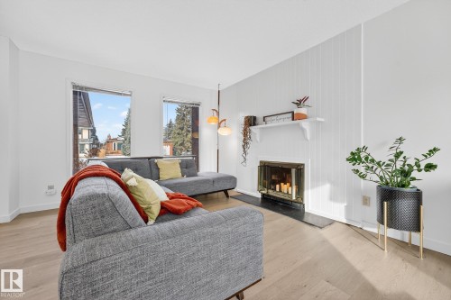 10523 17 Avenue Nw, Edmonton, AB - Indoor Photo Showing Living Room With Fireplace