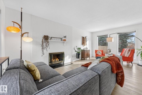 10523 17 Avenue Nw, Edmonton, AB - Indoor Photo Showing Living Room With Fireplace