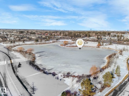 Snowy aerial view with a residential view - 91 603 Watt Boulevard, Edmonton, AB - Outdoor With View