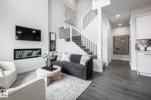 226 Falcon Crescent, Leduc, AB - Indoor Photo Showing Living Room With Fireplace