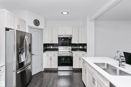 7703 Getty Wynd, Edmonton, AB - Indoor Photo Showing Kitchen With Double Sink