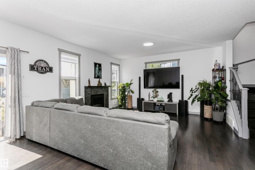 7703 Getty Wynd, Edmonton, AB - Indoor Photo Showing Living Room With Fireplace