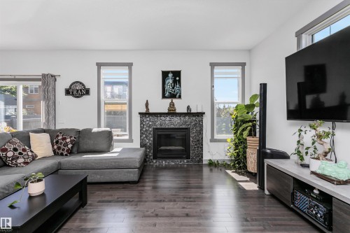 7703 Getty Wynd, Edmonton, AB - Indoor Photo Showing Living Room With Fireplace