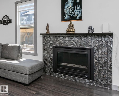 7703 Getty Wynd, Edmonton, AB - Indoor Photo Showing Living Room With Fireplace