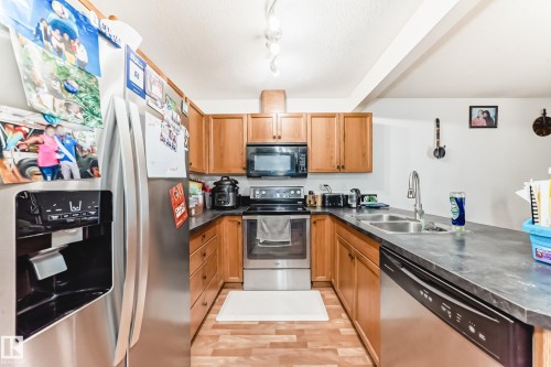 38-150 Edwards Drive Sw, Edmonton, AB - Indoor Photo Showing Kitchen With Double Sink
